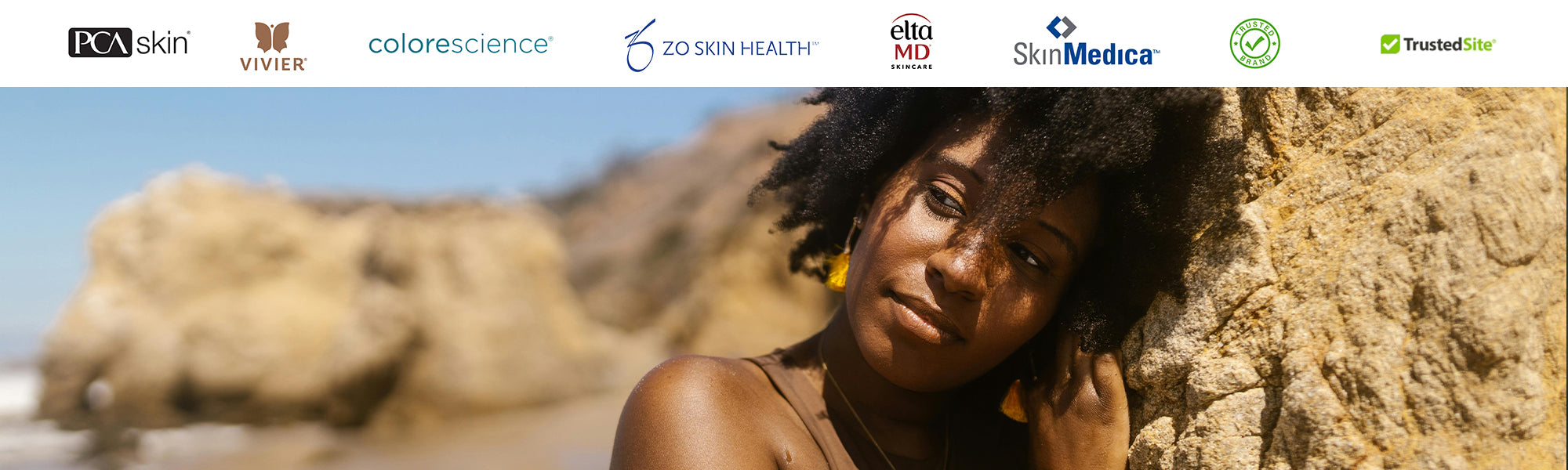 Woman with glowing skin on beach promoting Skin Boutique Online skincare brands like PCA Skin, ZO Skin Health, Vivier, SkinMedica