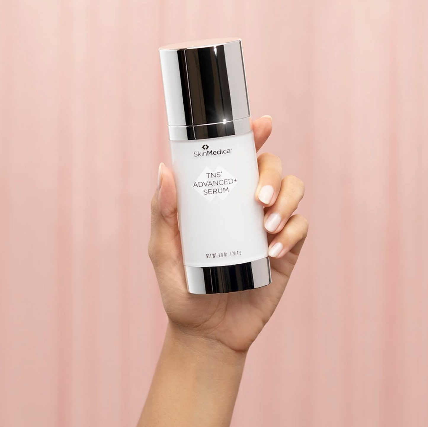 Front view of SkinMedica TNS Advanced+ Serum dual-chamber bottle